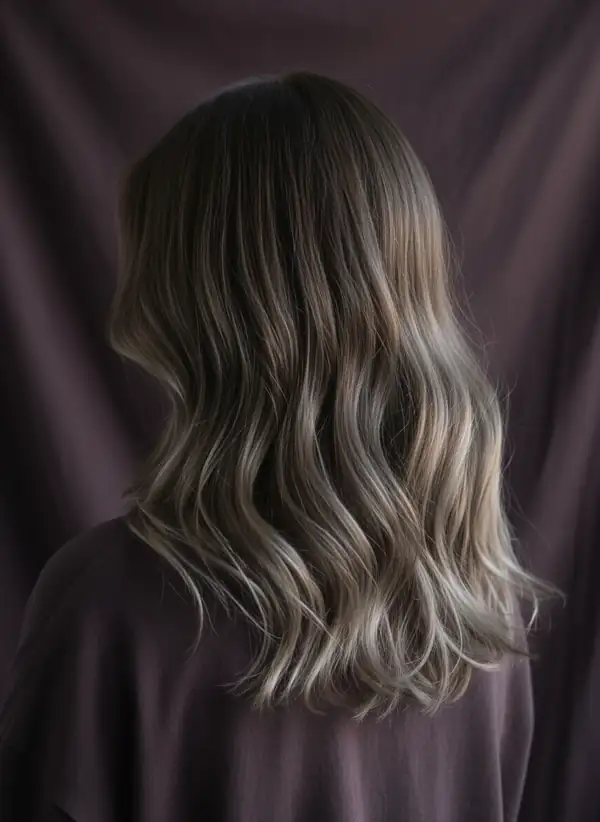 A cool silver wavy bob, photographed from behind